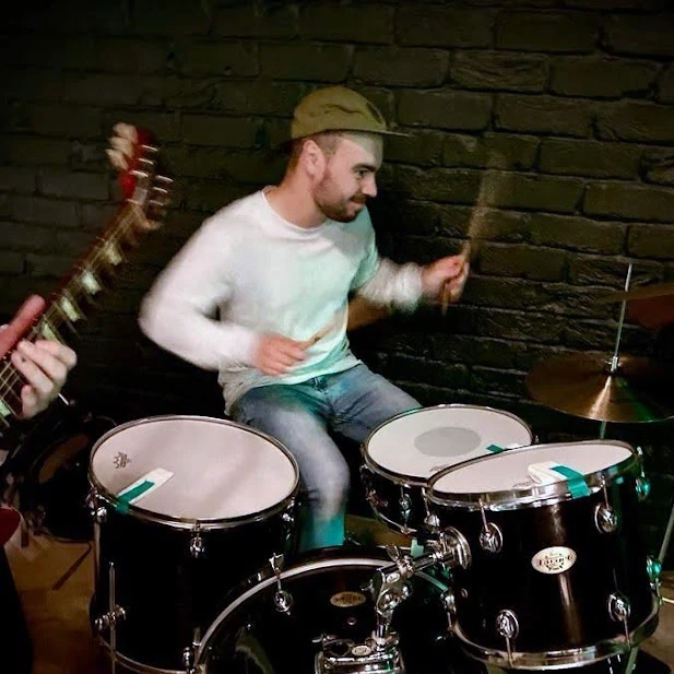 Ash from Stolen Jukebox playing drums