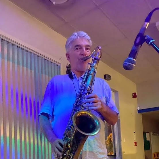 Mark from Stolen Jukebox playing saxaphone